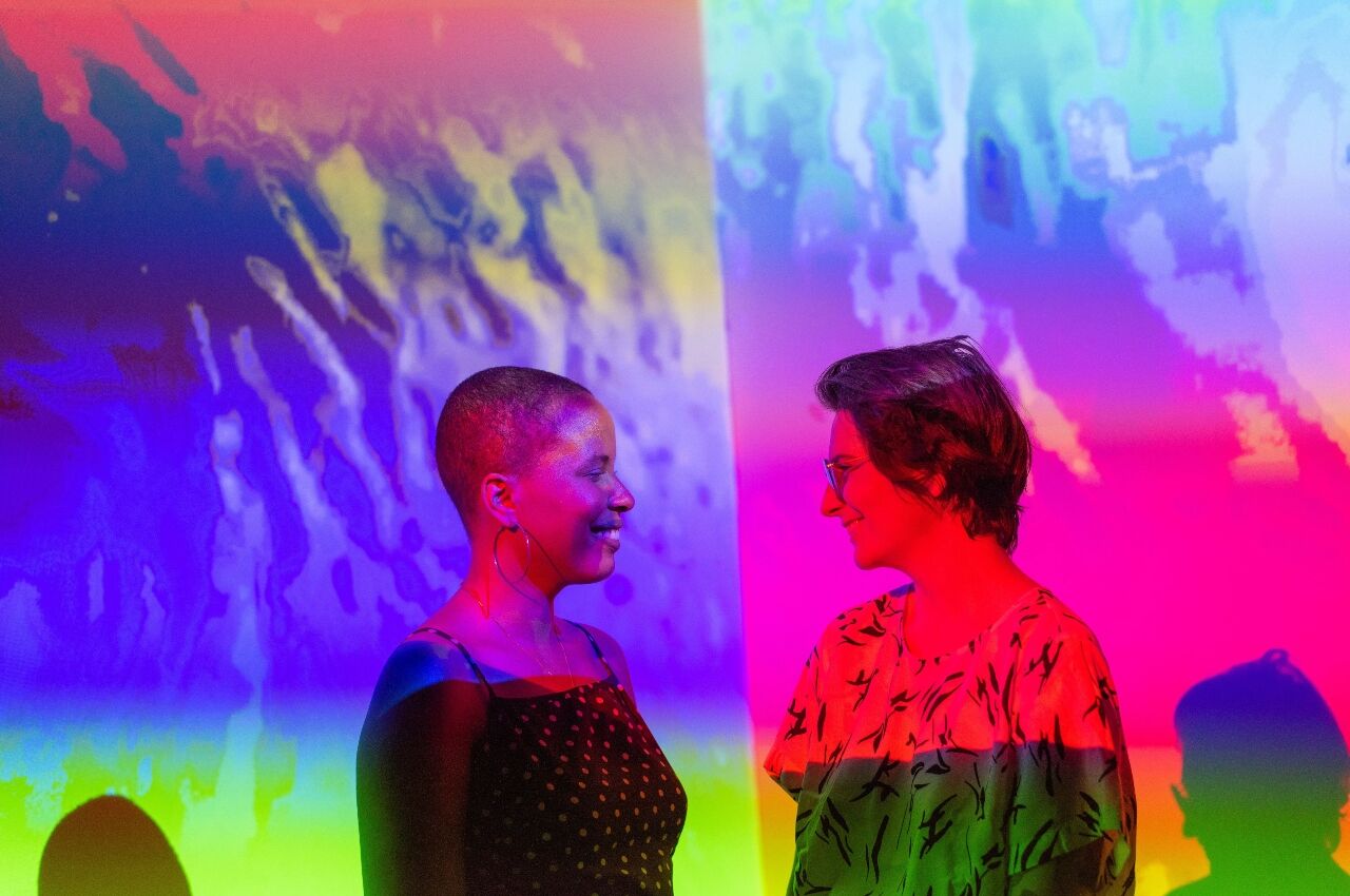 Two people in art museum in gay Miami