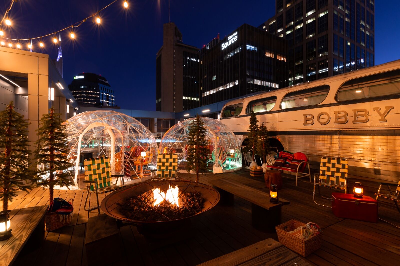 The Bobby Rooftop at night one of the best rooftop bars Nashville